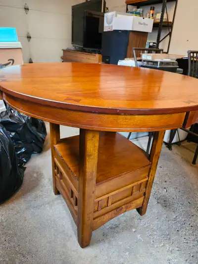 Round 42x36 expandable solid wood card table., View more