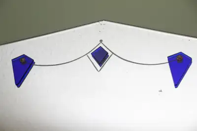 Available! Rare Art Deco 1920s wall mirror with blue accents and bevelled edges. We found it difficu...