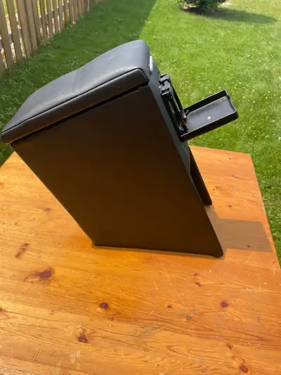 BRAND NEW... Center Consale out of a Honda Fit. will fit other cars. $ 25.00