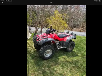 This pre-owned Honda TRX350FE 4x4 ATV features convenient electric shift functionality and comes equ...