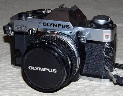 I have 1 Olympus OMG camera body with a Zuiko 50mm f1.8 lens in very nice shape. The OMG body with l...
