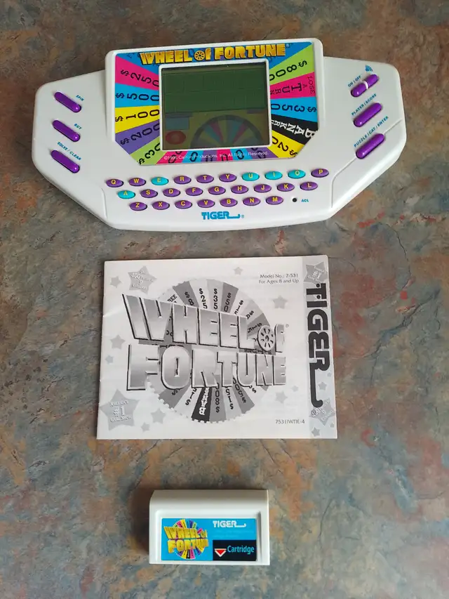 Vintage 1995 Wheel of Fortune Electronic Handheld Game