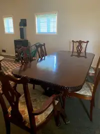 Hand Carved Solid Mahogany Dinner Table and 8 Chairs