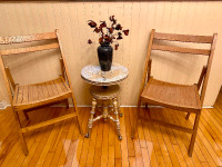 A pair of solid wood folding dining chairs, patio chairs