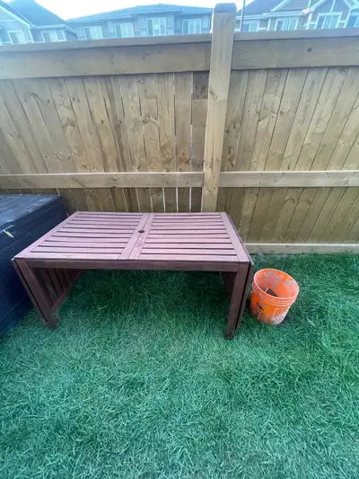 Outdoor table that expands with two chairs in good condition just repainted