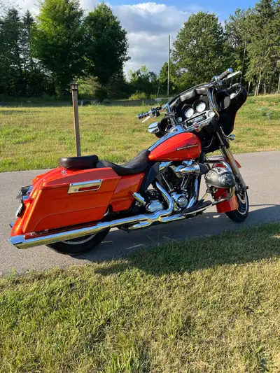 Selling my 2012 street glide Bike gets all the looks for sure a head turner Bike is loud Crusies ver...