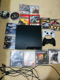 PlayStation 3 Slim with 15 games & 2 Controllers