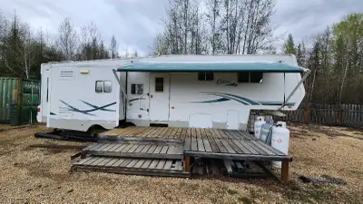 Three popouts, queen size bed, full bathroom, full kitchen, living room with queen sized sofa bed. T...