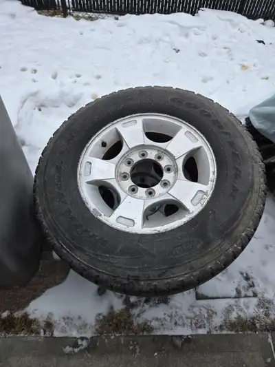 2 tires with ford mags
