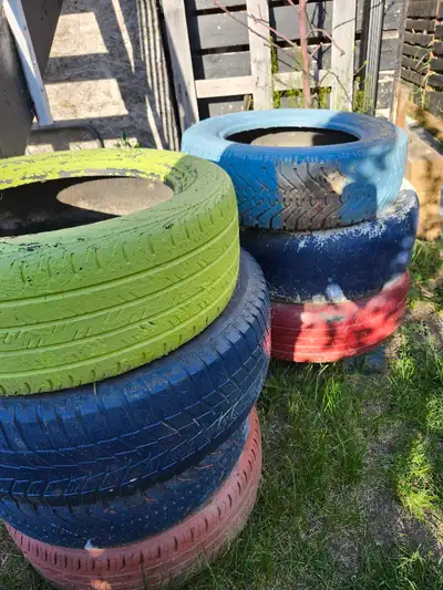 7 Painted Tire Garden Planters, View more