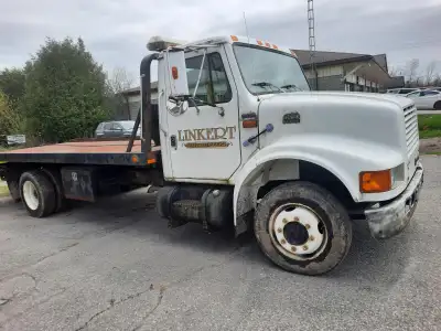 1998 International. Tilt load tow truck for sale. Needs work. $29,000 OBO Located in Bridgenorth. Se...