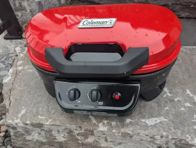 Coleman portable BBQ. Small enough to take it on the go to any event. Great for an apartment or cond...