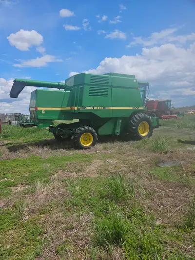 For sale 1994 John Deere 9500 combine good condition excellent for straw comes with pickup header an...