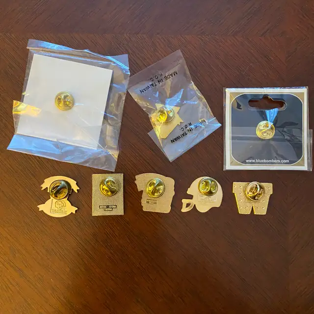 Lot of 8 Asst’d Winnipeg Blue Bombers Lapel Pins62854392211331121