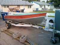14’ lund skiff and a 12’ boat