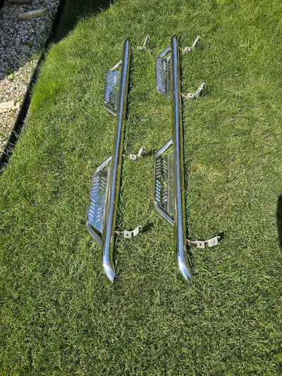NFab stainless steel side steps. Part# HPC1970CC-SS Some minor damage shown in pictures.