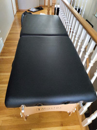 Like New Master 28" massage table for sale.