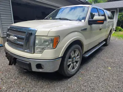F150 lariat for sale as is for parts. Drive train runs well. Will sell cap separately (500.00)