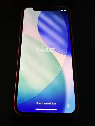 This is a vibrant red iPhone 12 Mini, known for its compact size and powerful features. It has been...