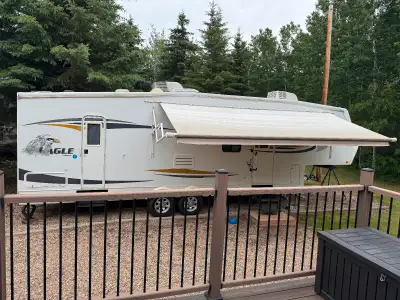 Selling our 2008 Jayce Eagle fifth wheel trailer. Trailer has double bunks in the back, master bedro...
