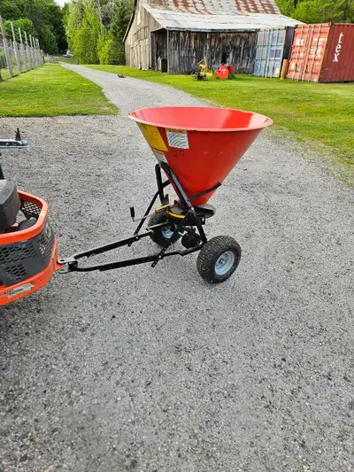 Befco fertilizer and seed spreader for larger property. Pull behind lawn tractor or ATV. Ground driv...