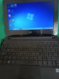Mini 110 HP laptop. 14 inch screen, Windows 7 starter,