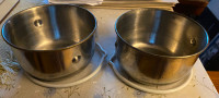 Two Stainless steel bird food bowls