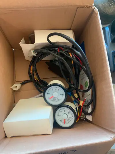 2003 - 2007 5.9L diesel steering column gauges. Pyrometer and boost gauge. $75 obo