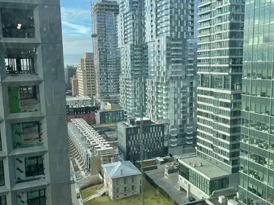 The new construction Solstice condo is located in the center of Montreal, surrounded by two English...
