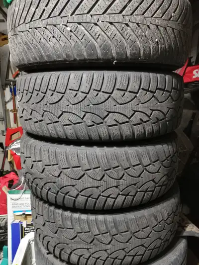 4 winter tires 215 65 15 on rims 5x114.3 bolt pattern fits hyundai and kia as well as others tires a...