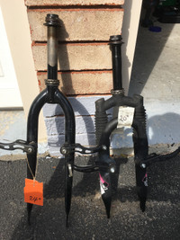 Bicycle front fork and pump. $5.00 each.