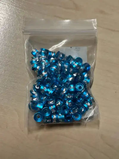 Blue and silver tin charms brand new never used ! Super pretty blue and silver little charms , have...