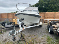 19’ cuddy boat with trailer 