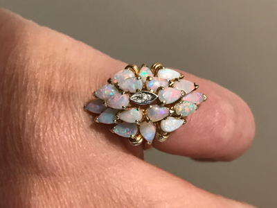 14k Opal Cluster Dinner ring. iPhone doesnt capture the vivid play of colors on this 14k Cocktail ri...