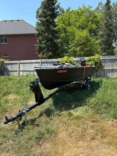 14ft aluminum with 40hp mercury and steering wheel. Includes, Trailer Boat Motor Safety kit Anchor L...