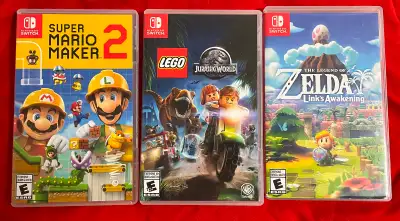jeux nintendo switch -super mario maker 2: 50$ -lego jurassic world: 40$ -the legend of zelda, link’...