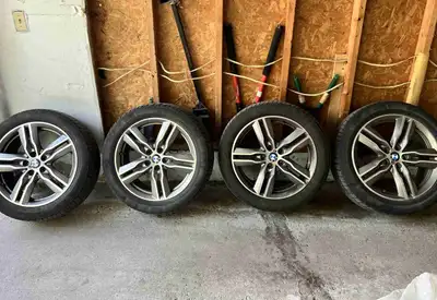 OEM BMW X1 M rims with snow tires. Came from 2018 BMW X1, should fit other years of X1 or X2 models....