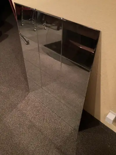 32 inches by 44 inches - can be hung vertically or horizontally. Exceptional quality plate glass.
