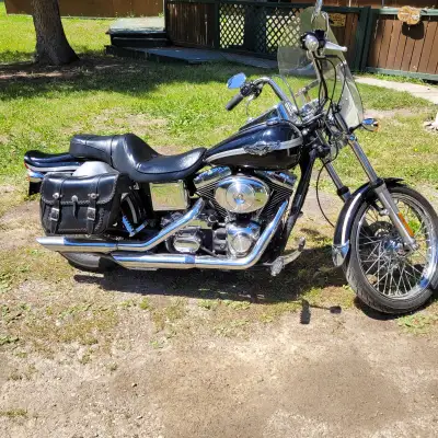 Selling my 2003 Harley Davidson 100th Anniversary Dyna Wide Glide. Bike is in excellent condition. A...