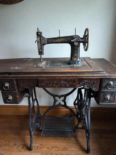 Antique Raymond sewing machine., View more