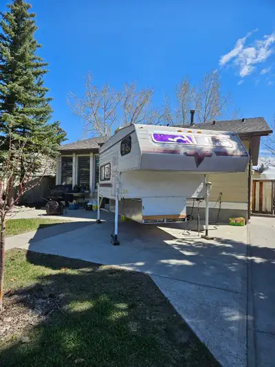 Heavily Modified Camper with Electric Jacks and Air Conditioning. This camper is a little rough to t...