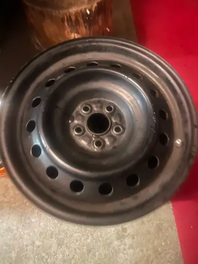 Four excellent condition tire rims, $25 a piece, I think they’re 18 inch
