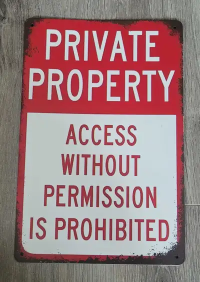 Add a touch of vintage charm to your space with this 'Private Property' sign, designed with a distre...