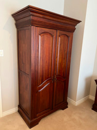 Solid wood armoire in pristine condition in Burlington