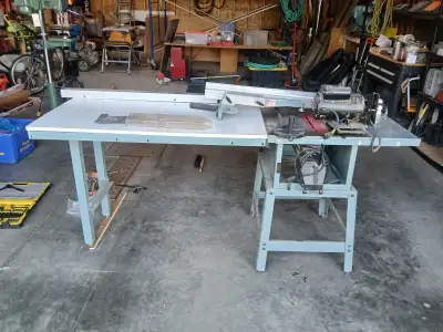 Delta steel top table saw using a Delta 43 inch guide Unifence with a 7 foot rail & 27 inch x 7 foot...