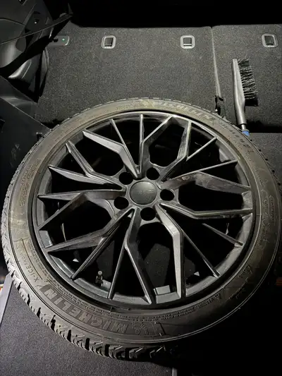 I am selling a used rim and tire combo, featuring a Michelin X-Ice Snow tire, size 235/45R19. This s...