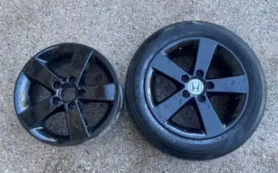 2 rims of 16" Honda Civic Rims. The tire has lots of thread. $100 for both.