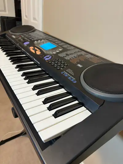 PIANO KEYBOARD IN PERFECT CONDITION & STAND , View more