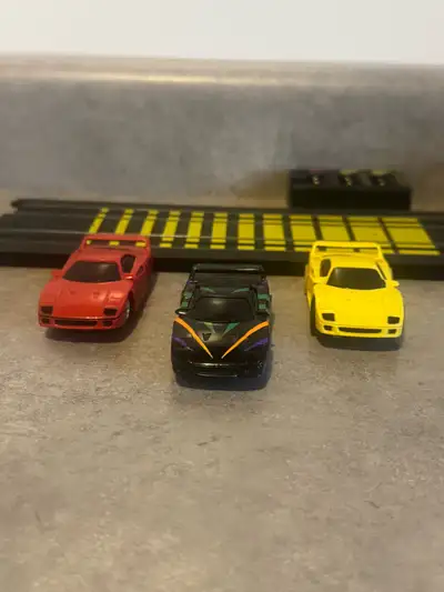3 TYCO FERRARI F-40 SLOT CARS, View more