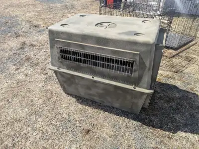 Large dog crate. Please call 506-836-7418 Poster is not seller.
